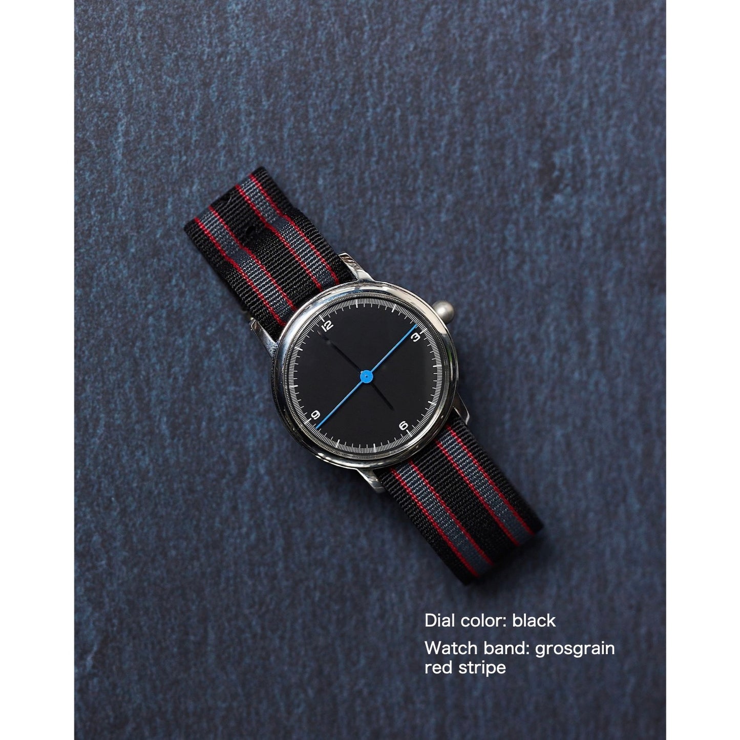 Dial color: black / watch band: grosgrain red stripe