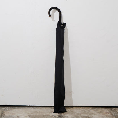 The umbrella comes  with a matching storage sleeve.