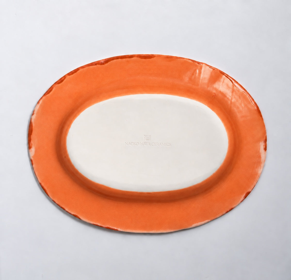 Naoko Hata Ceramics Oval Plate<br>Sunrise orange