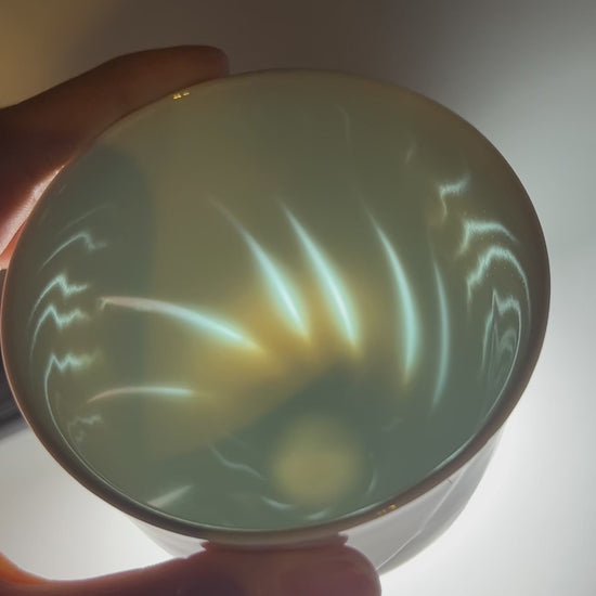 light filtering through the carved porcelain